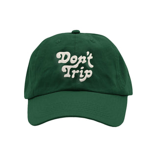 Green cap with 'Don't Trip' text on a white background