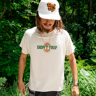 Free & Easy tan tee shirt with an orange and green design