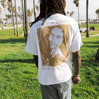 Free & Easy Bob Marley white tee shirt with a gold design
