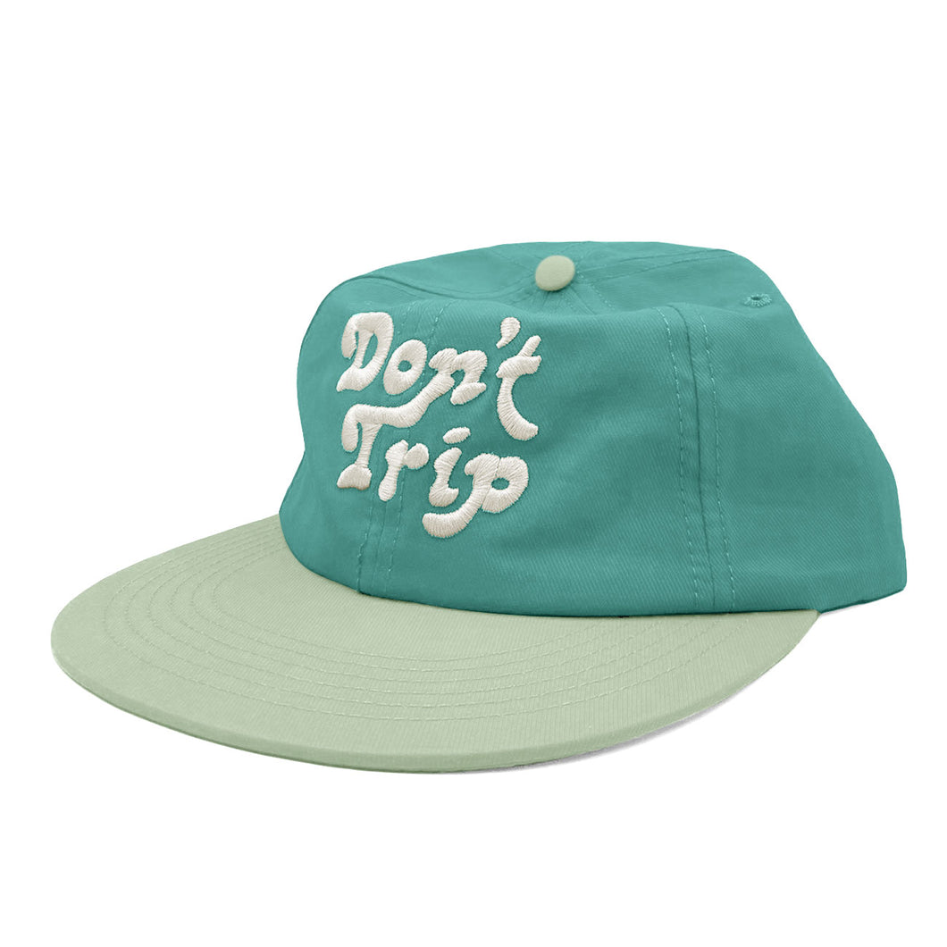 Don't Trip teal and mint lightweight hat with white embroidered Don't Trip logo on white background - Free & Easy