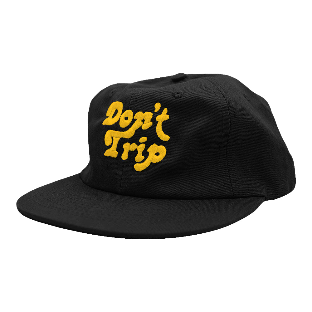 Don't Trip black hat with yellow embroidered Don't Trip logo on white background - Free & Easy