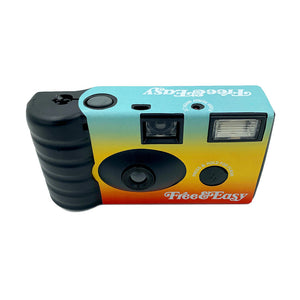 Free & Easy disposable camera black with color gradient wrap, top view -Free & Easy