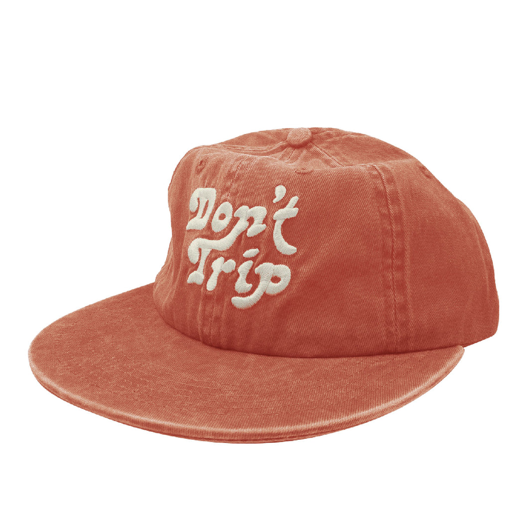 Don't Trip orange hat with white embroidered Don't Trip logo on white background - Free & Easy