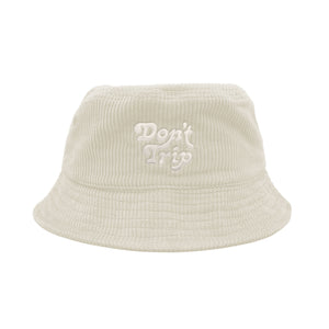 Free & Easy Don't Trip Fat Corduroy Bucket Hat in cream with white Don't Trip embroidery on a white background - Free & Easy