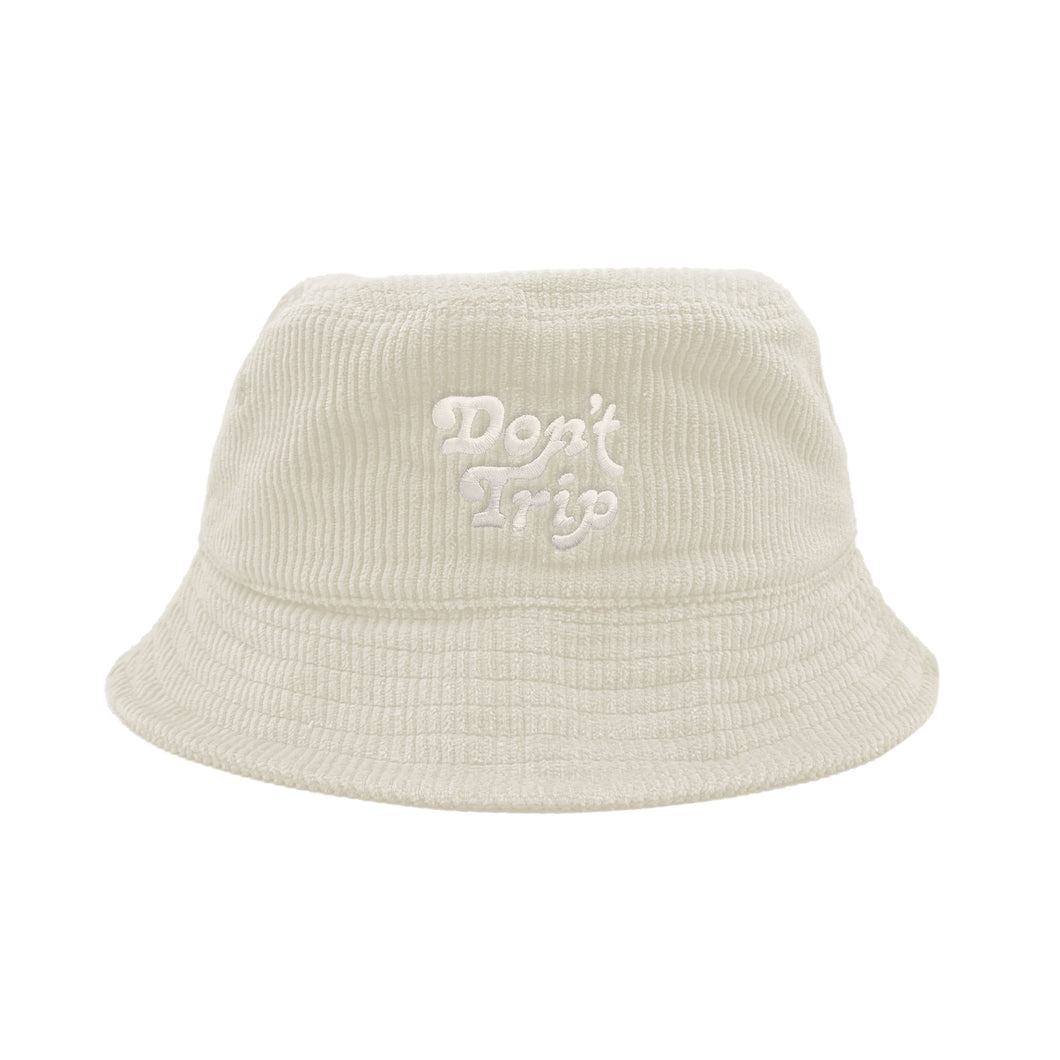 Free & Easy Don't Trip Fat Corduroy Bucket Hat in cream with white Don't Trip embroidery on a white background - Free & Easy