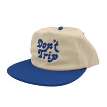 Load image into Gallery viewer, Don&#39;t Trip Two Tone Snapback Hat in natural and royal blue with blue Don&#39;t Trip embroidery on a white background -Free &amp; Easy
