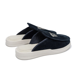 F&E x Lusso Cloud Esto navy slipper with white Don't Trip embroidery on white background, back view - Free & Easy
