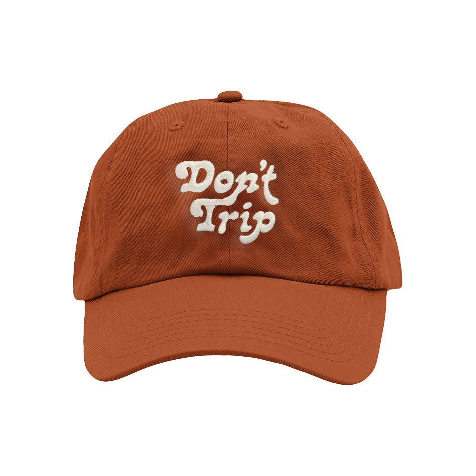Don't Trip Dad Hat in rust with white Don't Trip embroidery on a white background -Free & Easy