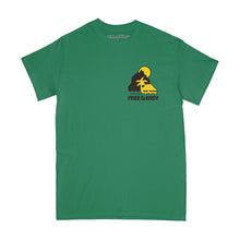 Load image into Gallery viewer, Bali Hai SS Tee in green with yellow and brown design on a white background -Free &amp; Easy
