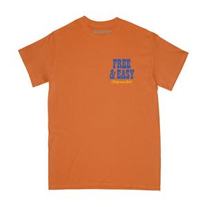 Motel Short Sleeve Tee in orange with navy and yellow design on a white background -Free & Easy