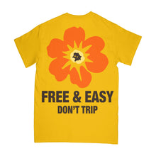 Load image into Gallery viewer, Island Flower Short Sleeve Tee in yellow with an oraange flower and brown Free &amp; Easy Don&#39;t Trip on a white background - Free &amp; Easy
