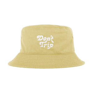 Free & Easy Don't Trip Bucket Hat in light yellow with white Don't Trip embroidery on a white background -Free & Easy
