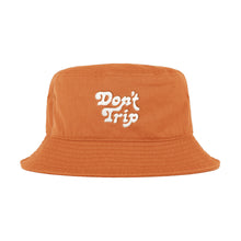 Load image into Gallery viewer, Free &amp; Easy Don&#39;t Trip Bucket Hat in orange with white Don&#39;t Trip embroidery on a white background -Free &amp; Easy
