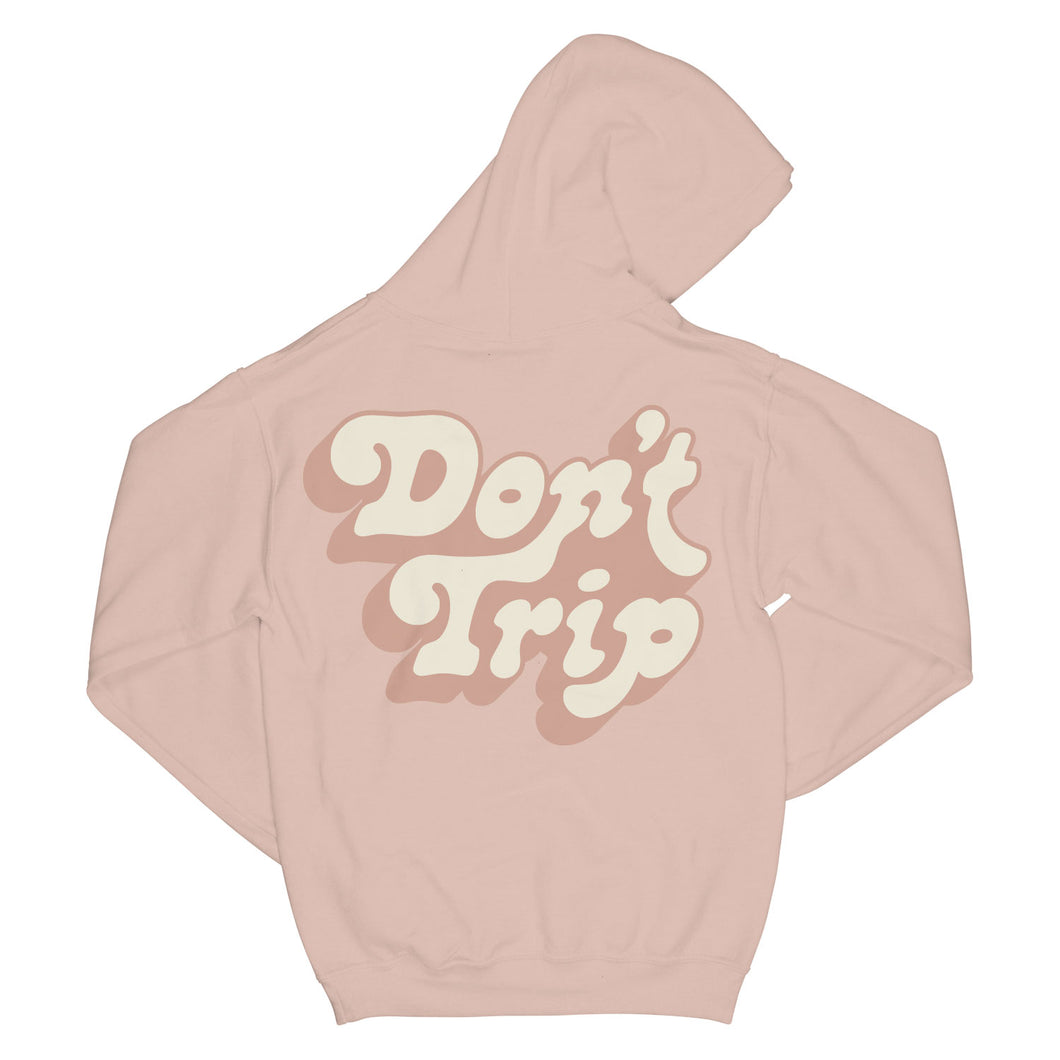 Don't Trip OG Hoodie in light pink with white and light pink Don't Trip logo design on back on a white background - Free & Easy