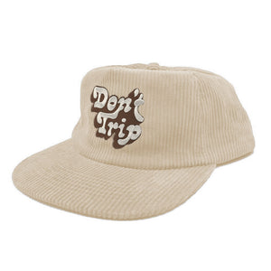 Don't Trip cream corduroy hat with white and brown embroidered Don't Trip logo on a white background - Free & Easy
