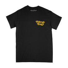 Load image into Gallery viewer, Be Happy LA SS Tee in black with a yellow LA Don&#39;t Trip smiley face design on a white background -Free &amp; Easy
