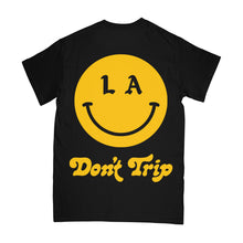 Load image into Gallery viewer, Be Happy LA SS Tee in black with a yellow LA Don&#39;t Trip smiley face design on a white background -Free &amp; Easy
