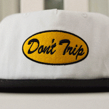 Load image into Gallery viewer, Oval Two Tone Short Brim Snapback Hat
