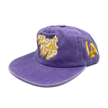 Load image into Gallery viewer, Don&#39;t Trip Washed Snapback Hat in purple with white and yellow Don&#39;t Trip embroidery and a yellow LA design on a white background -Free &amp; Easy
