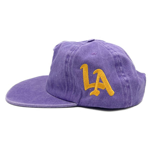 Don't Trip Washed Snapback Hat in purple with white and yellow Don't Trip embroidery and a yellow LA design on a white background -Free & Easy