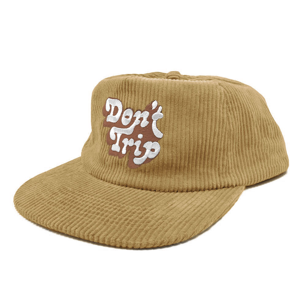 Don't Trip light brown corduroy hat with white and brown embroidered Don't Trip logo on a white background, front - Free & Easy