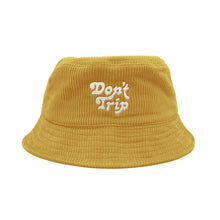 Load image into Gallery viewer, Free &amp; Easy Don&#39;t Trip Fat Corduroy Bucket Hat in gold with white Don&#39;t Trip embroidery on a white background - Free &amp; Easy

