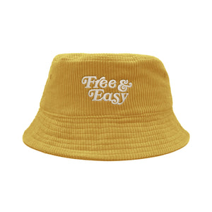 Free & Easy Don't Trip Fat Corduroy Bucket Hat in gold with white Free & Easy embroidery on a white background - Free & Easy