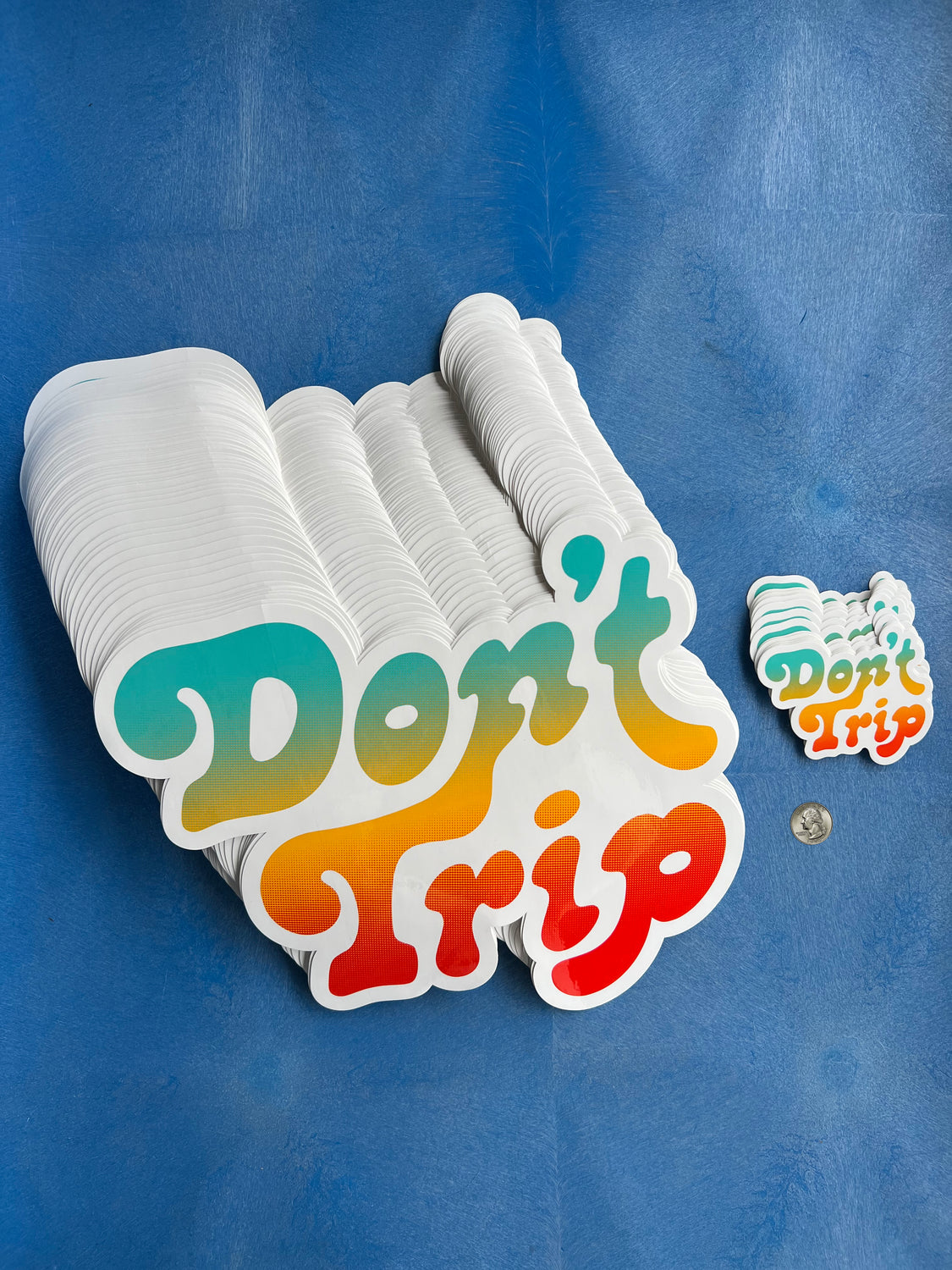 Don't Trip extra large multicolor logo vinyl sticker on blue background - Free & Easy