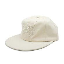 Load image into Gallery viewer, Don&#39;t Trip cream hat with white embroidered Don&#39;t Trip logo on white background - Free &amp; Easy
