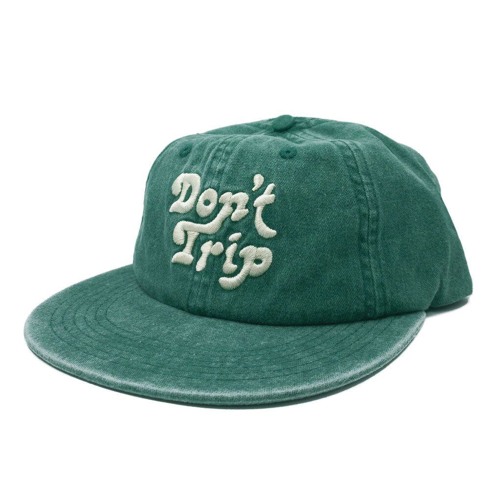 Don't Trip washed green hat with white embroidered Don't Trip logo on white background - Free & Easy