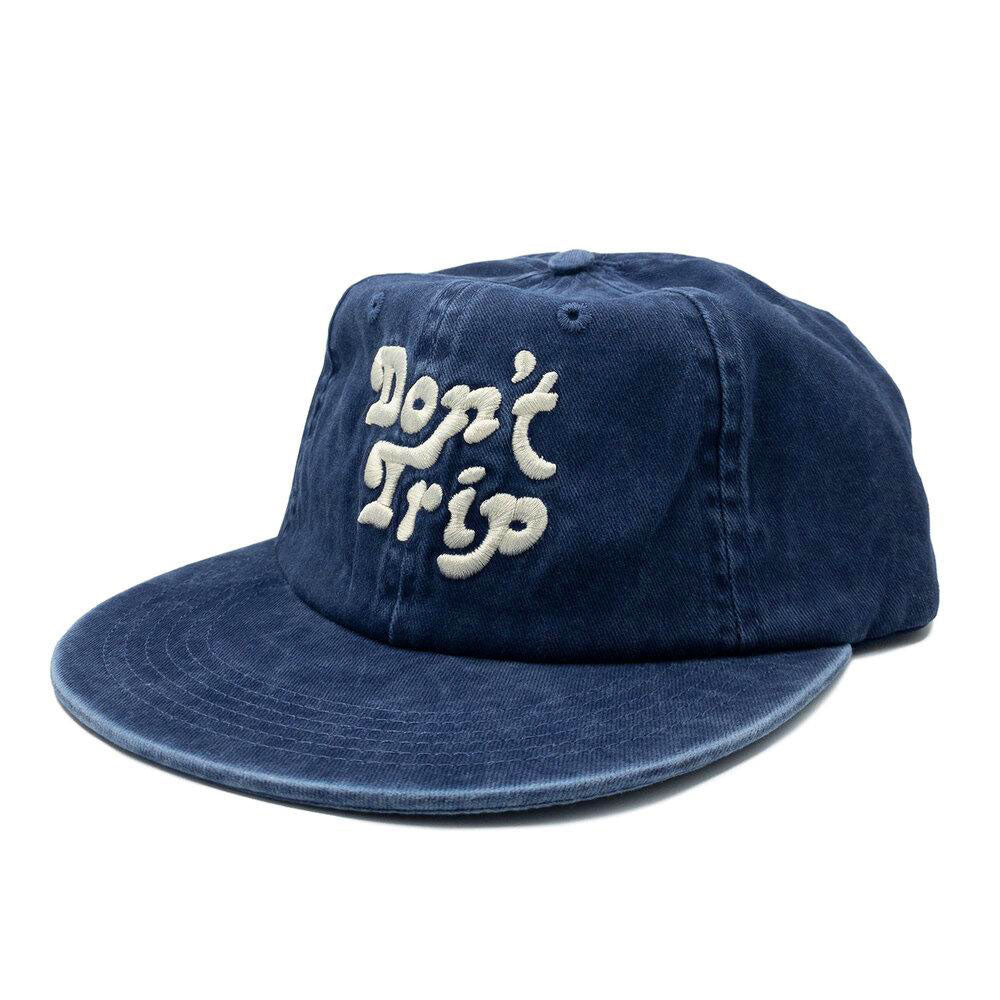 Don't Trip washed navy hat with white embroidered Don't Trip logo on white background - Free & Easy