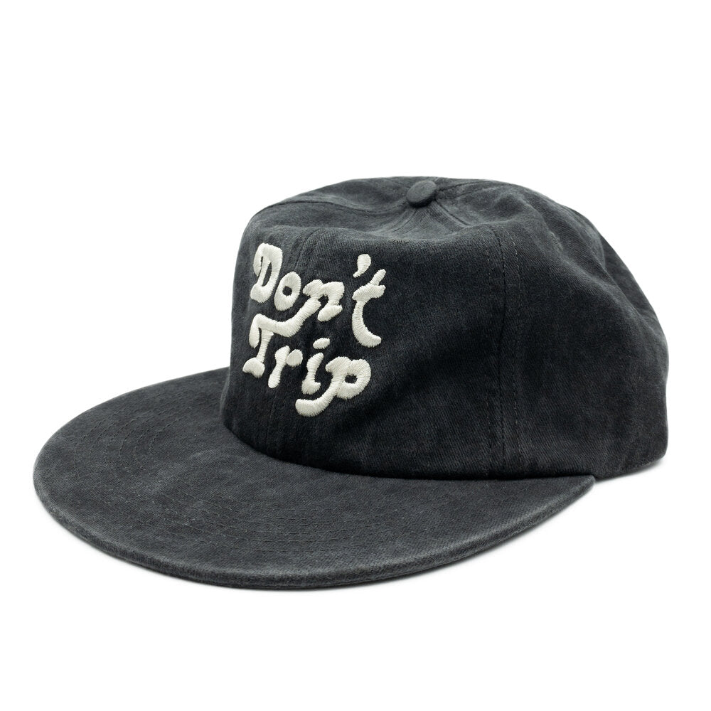 Don't Trip Washed Hat in black with white Don't Trip embroidery on a white background - Free & Easy