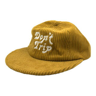 Don't Trip Fat Corduroy Hat in mustard with white Don't Trip embroidery on a white background -Free & Easy