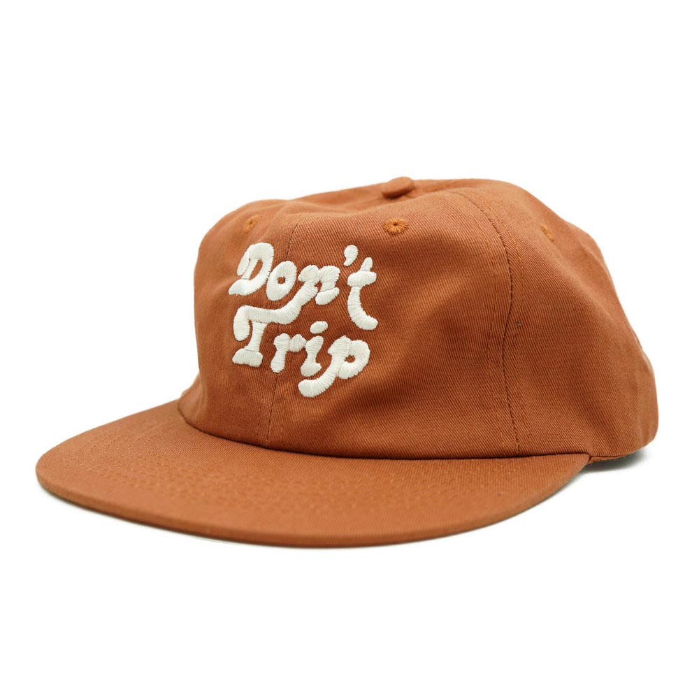 Don't Trip orange hat with white embroidered Don't Trip logo on white background - Free & Easy
