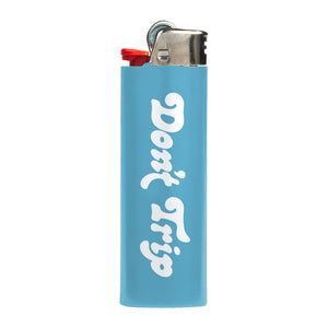 Don't Trip light blue lighter with white font, back,  on white background - Free & Easy